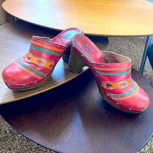 Super fun, red leather clogs.